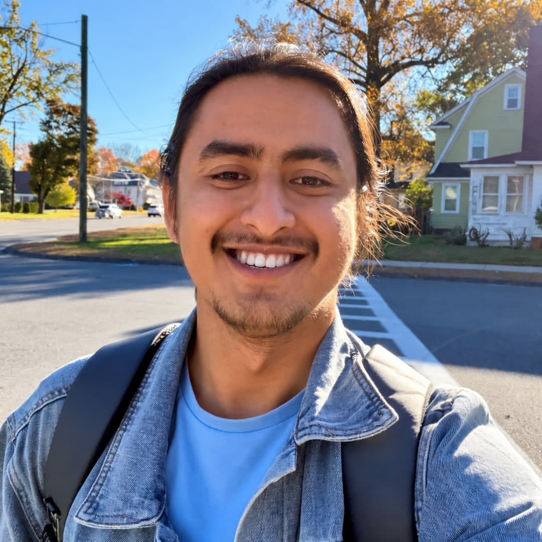 Diwash Lamichhane smiling outdoors on an autumn day
